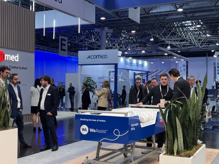 Blue WeAssist bed at Medica 2024
